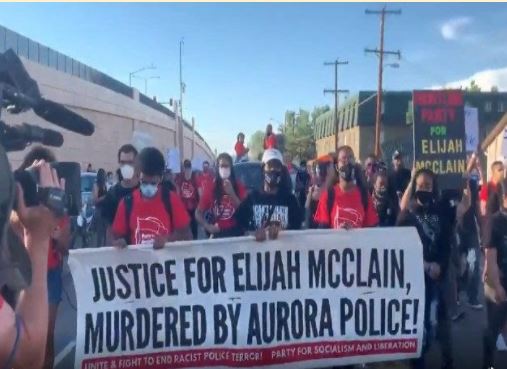 “ Hundreds march for justice for Elijah McClain from memorial to Aurora police district “ 